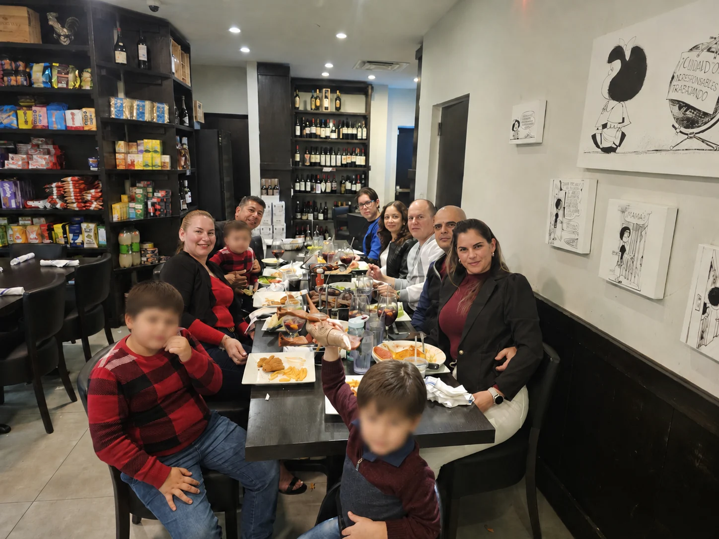 I.T.S. colleagues and their families sharing dinner together